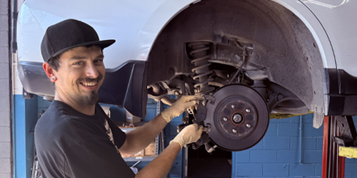 Staff Performing Brake Repair | Motorpool Automotive