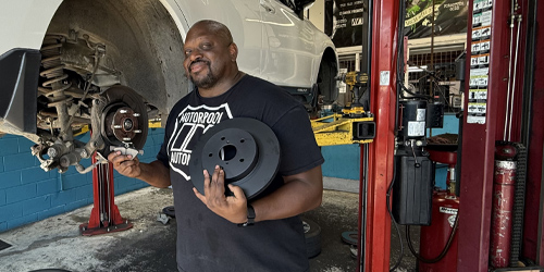 Staff Performing Brake Repair | Motorpool Automotive